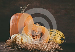 Pumpkins on wooden background