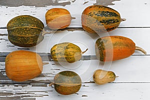 Pumpkins on the wooden table. Autumn. Thanksgiving background.