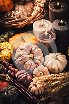 Pumpkins on wooden table - Thanksgiving, fall themed holiday table setting arrangement for a seasonal party