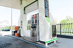 Pumps with benzine at modern gas station