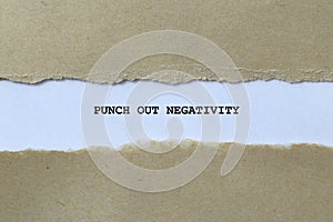 punch out negativity on white paper