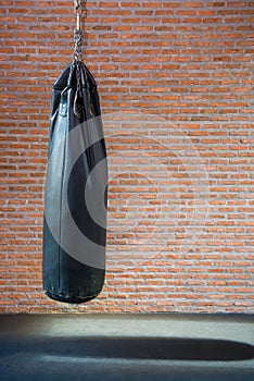 Punching bags in boxing room