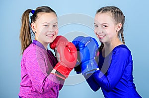 Punching knockout. Childhood activity. Fitness. energy health. Sport success. Friendship. Happy children sportsman in