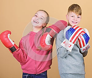 Punching knockout. Childhood activity. Sport success. Friendship fight. workout of small girl and boy boxer in