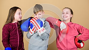 Punching knockout. Childhood activity. Sport success. Team fight. workout of small girls and boy boxer in sportswear