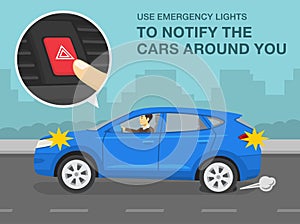 Punctured rear wheel or flat tire while driving a car. Use emergency lights to notify the cars around you on road.