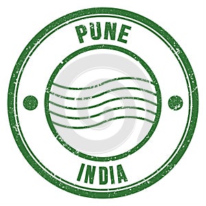 PUNE - INDIA, words written on green postal stamp
