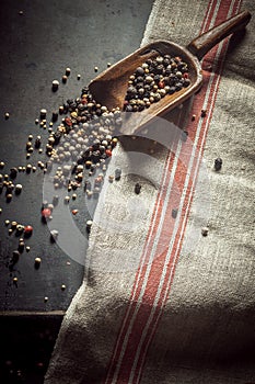 Pungent spicy dried peppercorns photo
