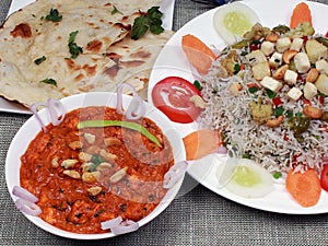 Punjabi cuisine paneer butter masala, mixed fried rice, butter naan