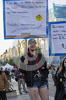 Punk girl on the demonstration on Prague Wenceslas square against the current government