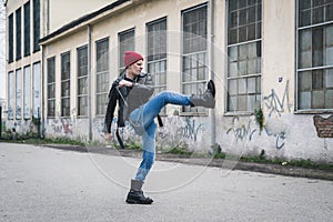 Punk guy posing in the city streets