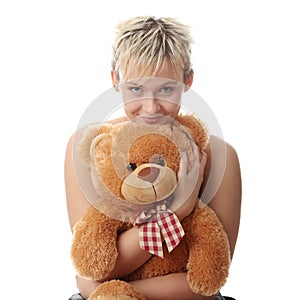 Punk teen girl with teddy bear