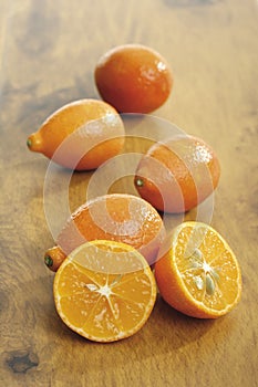 Punnet of kumquats in plastic container