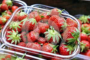 Punnet of organic strawberries photo