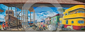 Wall mural of busy port on building in Punta Arenas in Chile