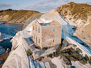 Punta Bianca, Agrigento in Sicily Italy White beach with old ruins of abandoned stone house on white cliffs