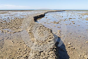 Punta Candor beach, Rota, Cadiz, Spain. Fishing weir, fish weir, fishgarth or kiddle photo