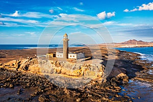 Punta de Jandia lighthouse from above, aerial blue sea, Fuerteventura, Canary Island, Spain. Punta Jandia lighthouse (Faro de