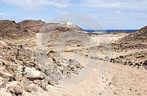 Punta Martino Lighthouse on the small island of Lobo photo