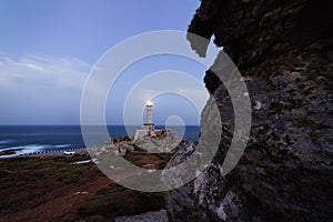 Punta Nariga Lighthouse at twilight, Bay of Biscay photo