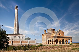 Punta Penna, Vasto, Abruzzo, Italy: lighthouse and church on the coast of the Adriatic Sea photo