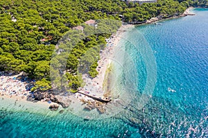Punta Rata beach in Brela, Croatia, aerial view. Adriatic Sea with turquoise clean water and white sand on the beach photo