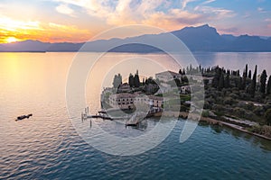 Punta San Vigilio, Garda Lake at sunset, aerial view. Italy