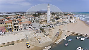 Punta Seca lighthouse, village aerial view photo