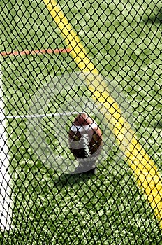 Punter`s Net And Football On Sideline