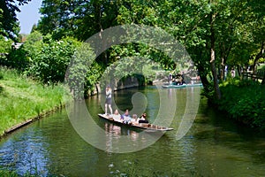 Punting on the River Cherwell near Christ Church meadow Oxford