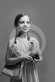 Pupil with braids and happy face on blue background