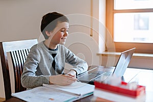 Pupil learning from home during crisis in video chat with teacher