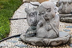 Pupil monk statue at Hsi Lai Buddhist Temple, California.