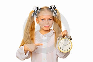 Pupil pointing to clock. Time management concept.