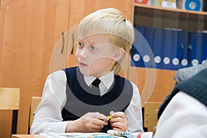 Pupil in school in the classroom