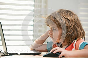 Pupil schoolkid studying homework math during lesson at classroom, education concept, Cute schooler.