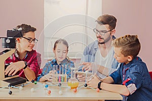 Pupils doing biochemistry research, stem education