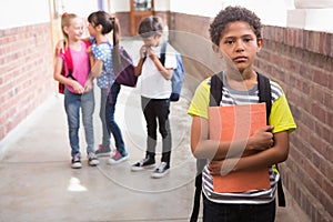 Pupils friends teasing a pupil alone