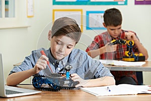 Pupils In Science Lesson Studying Robotics