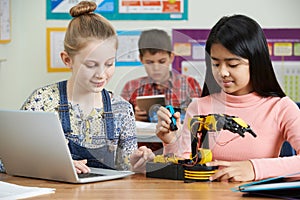 Pupils In Science Lesson Studying Robotics photo