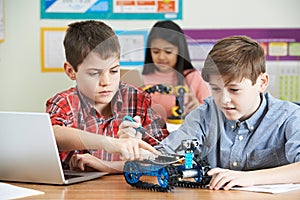 Pupils In Science Lesson Studying Robotics