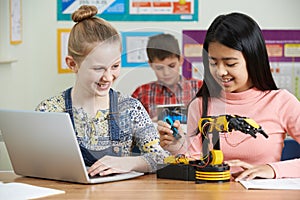 Pupils In Science Lesson Studying Robotics photo
