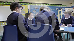 Pupils Working At Table Together