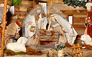 Puppet composition of the Nativity of Christ with the Jesus, Virgin Mary, Joseph, a manger, straw and the Magi who came