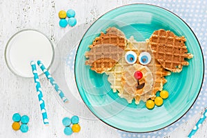 Puppy dog waffles for baby breakfast. Animal-shaped adorable art