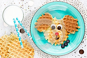 Puppy dog waffles for baby breakfast. Animal-shaped adorable art