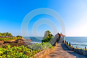 Pura Batu Bolong is the traditional Balinese temple located on a rocky, in the Tanah Lot area, Bali, Indonesia