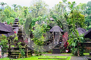 View on Hindu temple in green jungle with traditional puras photo