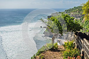 Pura Luhur Uluwatu temple, Bali, Indonesia. Amazing landscape - cliff with blue sky and sea