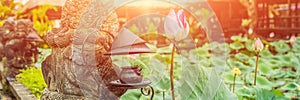 Pura Taman Kemuda Saraswati Temple in Ubud, Bali island, Indonesia with sunlight BANNER, long format